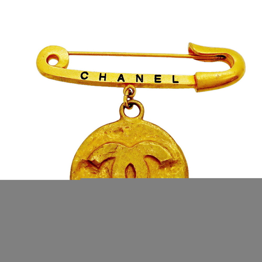 CHANEL Gold Logo Brooch